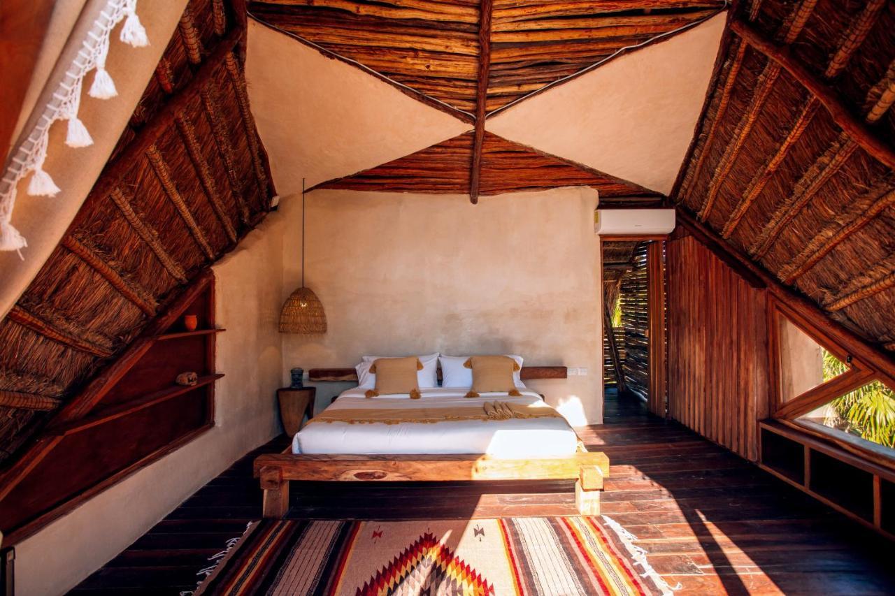 Ikal Tulum Hotel Exterior foto Interior of a villa at the resort